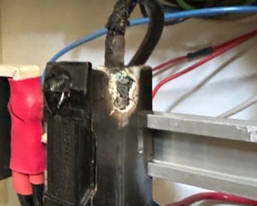 what could be the condition of your switchboard or fuse board when you hear buzzy noise or smell