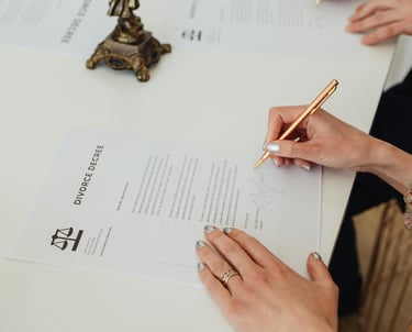 a woman is writing a letter to a man who is sitting at a table