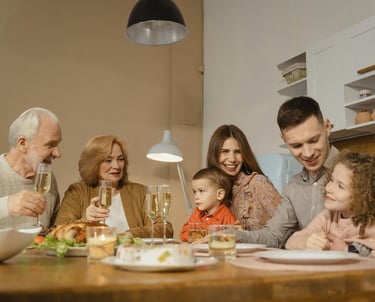 a family gathering at a dinner table