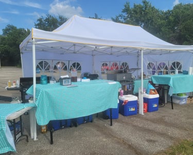 a tent with a table set up for a party