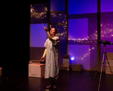 A white person in hospital gown raising her arm towards the ceiling. Behind her, stars dance.