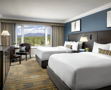 hotel queen beds and TV console