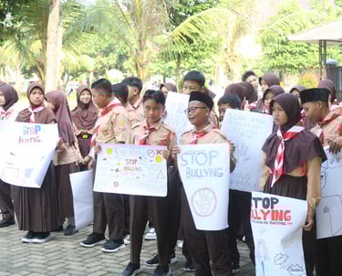 a group of people holding signs that read stop bullying