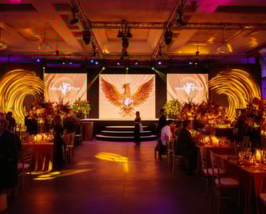 Verve Phoenix event with creative themed decorations, custom lighting, and engaging activities in a gold-accented venue.