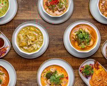 Thai Yellow, Red and Green Curries and chicken satay skewers.