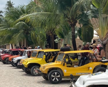 a row of jeeps parked in front of a building