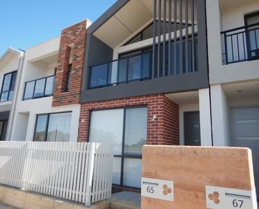 Perth building inspector assessing for structural defects. 