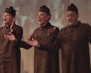 Three Priests from a Jesuit college. central to the story, energetically recruit sutdents.