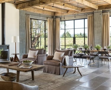 a living room with a fireplace and a fireplace