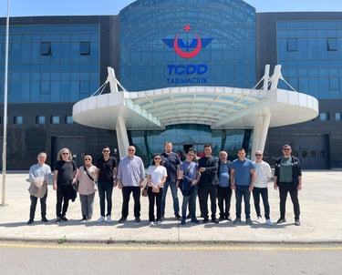 a group of people standing in front of a building