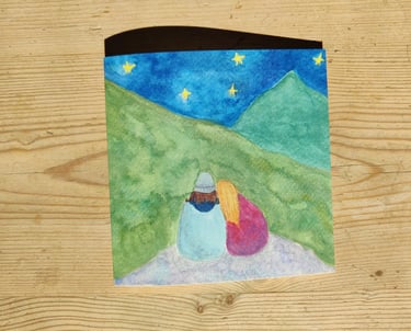 a queer greetings card of a couple in the mountains