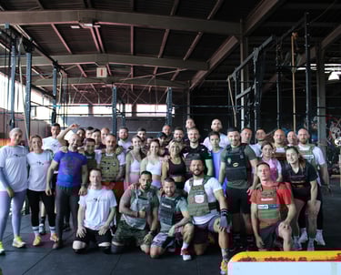 a group of people standing in a gym