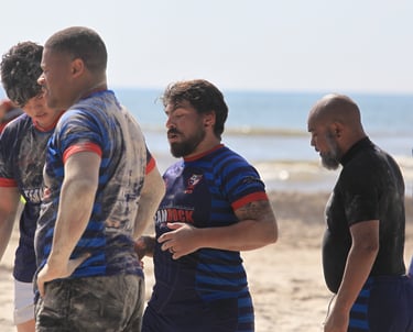 a group of men in striped shirts and shorts