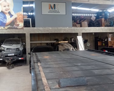 a car parked in a garage with a car parked in the garage