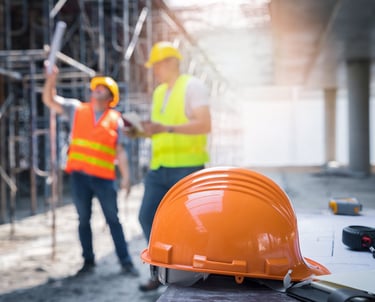 two men in safety vests and safety vests