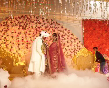 "Ring ceremony decoration with elegant backdrop and flowers"
