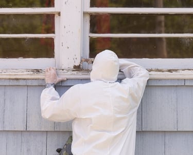 a man in a white suit and a white shirt