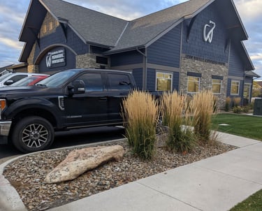 a truck parked in front of a house