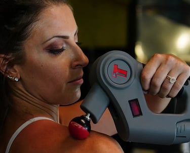 Deep tissue massage gun for muscle pain.