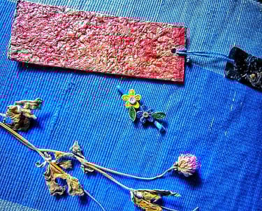 purple and yellow lower hair clips with recycle paper red texture bookmark also black dry flower pendant 