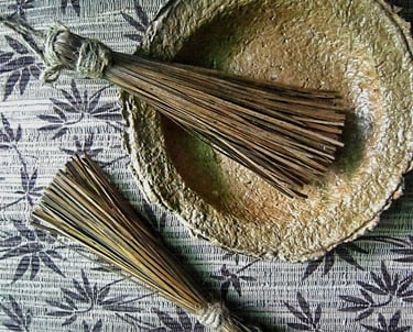 One set tassel ,one tassel on the recycle paper plate and one tassel beside of plate 