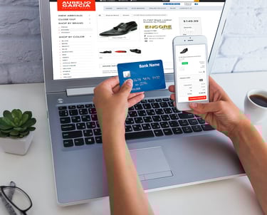a person holding a credit card and a credit card