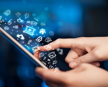 a person holding a cell phone in their hand