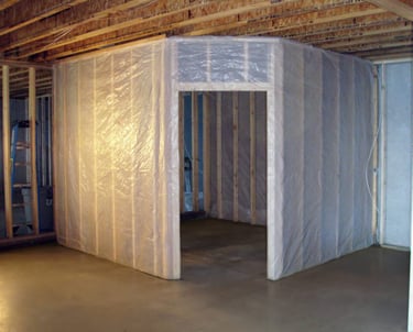 Wine cellar framing with the addition of a vapor barrier.