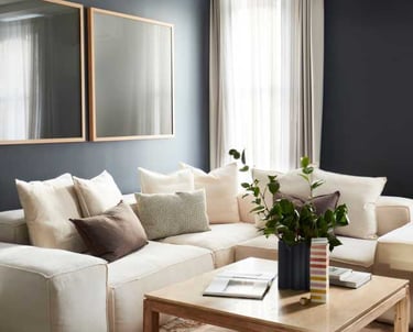 a living room with a couch and a coffee table