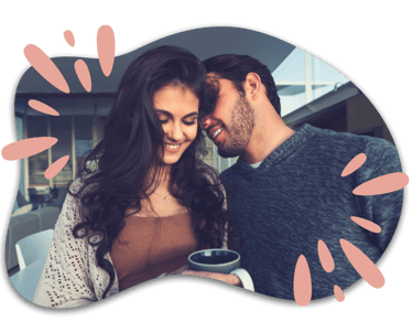 a man and woman lovingly next to eachother