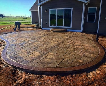 a patio with a brick patio with a brick patio