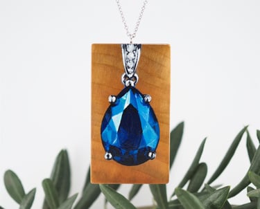 hand painted blue sapphire on cherry wood pendant 