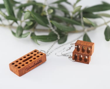 necklace and earrings made from padouk wood in a shape of miniature bricks