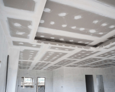 Tweelaags verlaagd plafond van gipsplaten (Gyproc).