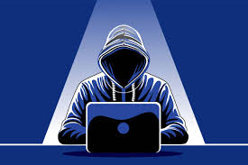 Hacker wearing a mask using a laptop, symbolizing cyber attacks and the importance of crypto securit