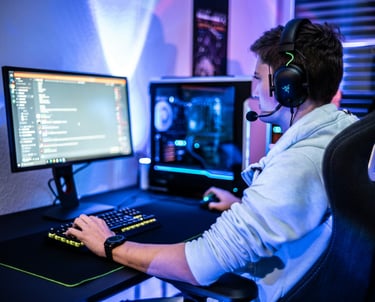 Person gaming at a desk on a computer using Discord, with a digital-themed background, representing 