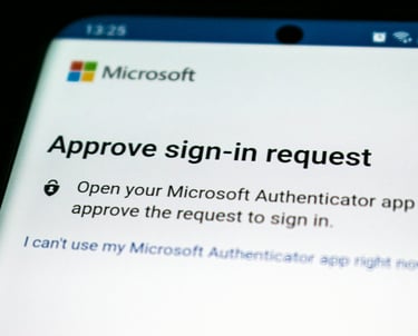 Cell phone displaying an approved sign-in request, illustrating two-factor authentication (2FA) for 