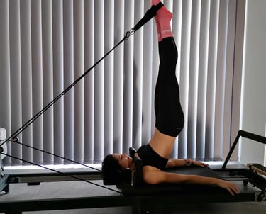 long spine stretch on the reformer
