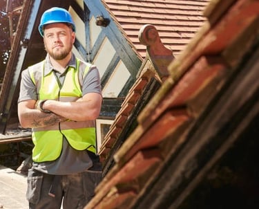 proud roofer posing for the camera