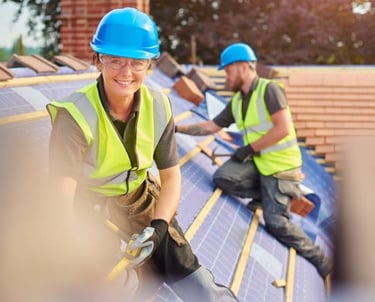 2 roofers installing a roof