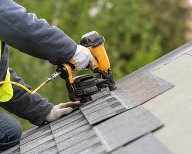 stapling in new roof tiles