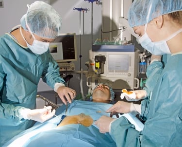 An image of doctor and nurses in an operation room