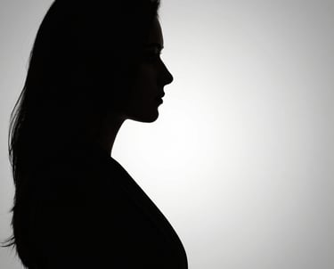 woman wearing black scoop-neck long-sleeved shirt