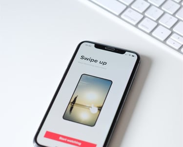 iphone xs on white table