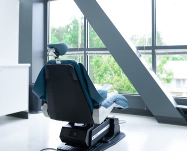 A dental chair with a view to the outside.