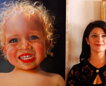 The artist Selen Cinus posing next to one of her paintings