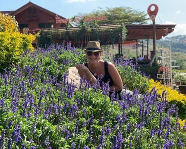 WNY homeowner walking through a lavender garden during a boutique garden design session.