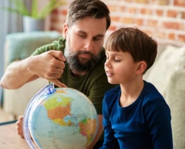 parent showing earth globe to kid