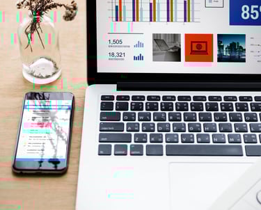 Colorful data dashboard on a laptop in a sleek office setting