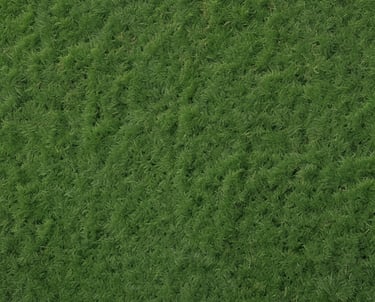 Close-up of lush green artificial turf carpet laid out in a sunny backyard.